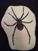 embroidered spider design